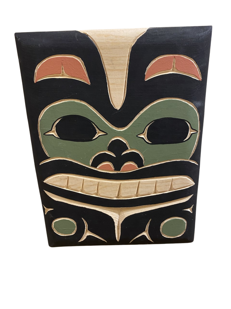Hand carved and painted Northwest Totemic. Bear Design using sustainable and upcycled wood and nontoxic paints. Colors include Black, Red, Green, and Natural Wood