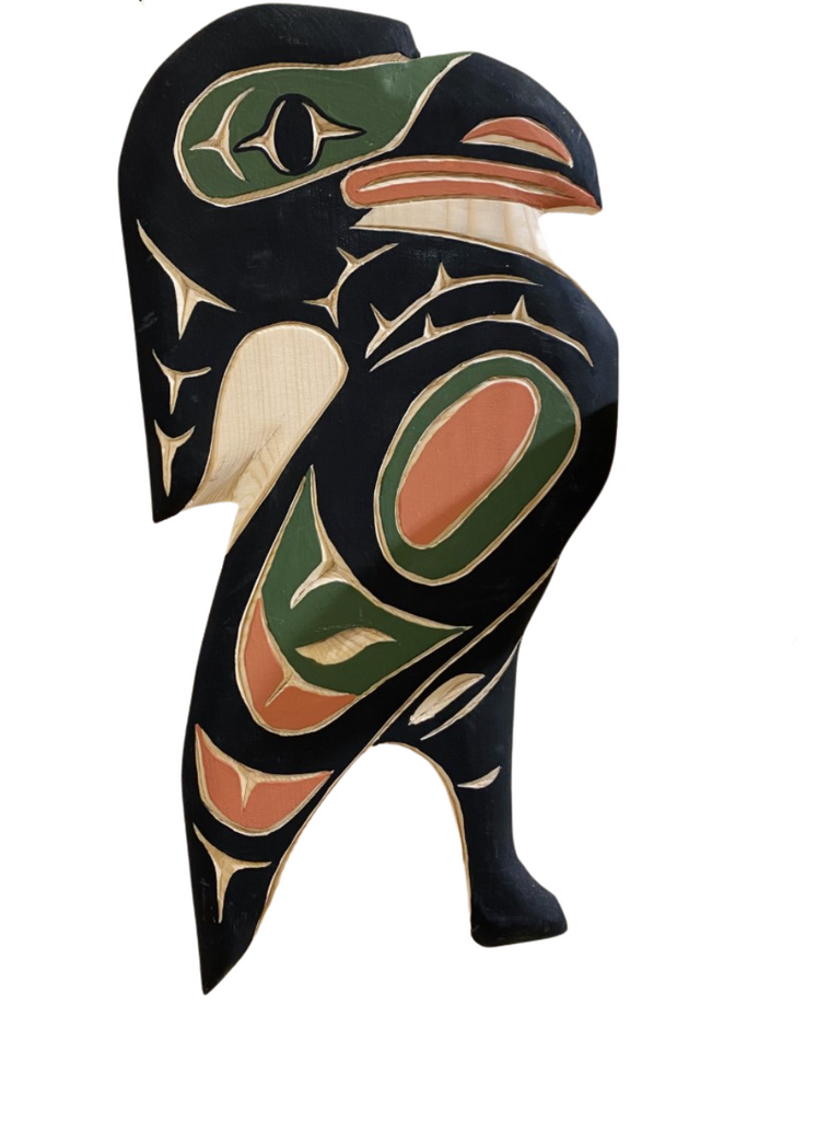 Hand carved and painted Northwest Totemic. Heron Design using sustainable and upcycled wood and nontoxic paints. Colors include Black, Red, Green, and Natural Wood