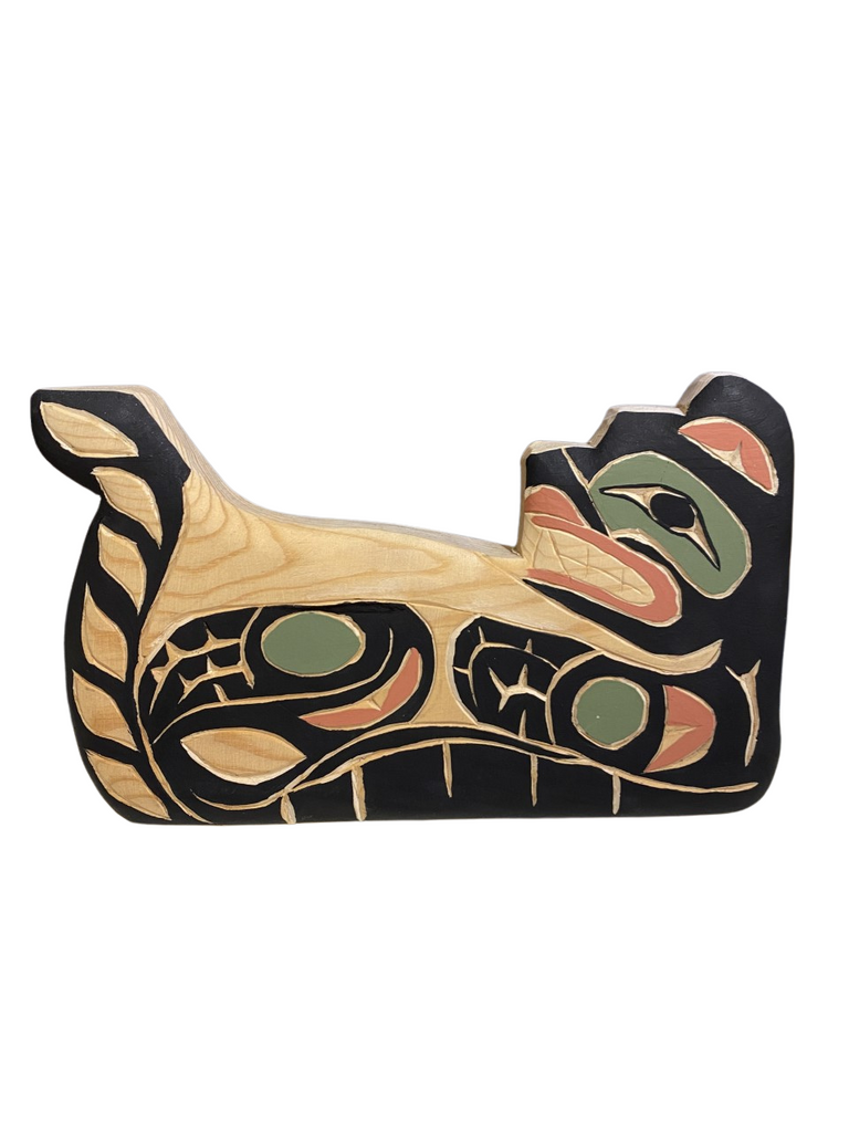 Hand carved and painted Northwest Totemic. Otter Design using sustainable and upcycled wood and nontoxic paints. Colors include Black, Red, Green, and Natural Wood